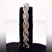 Braided Twist Cuff Bracelet in Sterling Silver.