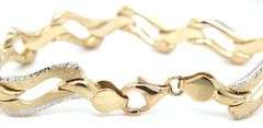 14kt Two tone gold diamond cut woven link bracelet