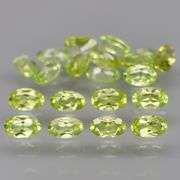 High grade 5.24ct untreated apple green Peridot set