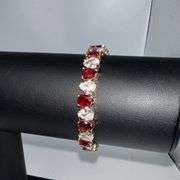 18 Kt Yellow Gold Plated Huge 32.5 Ctw Simulated  Ruby Tennis Bracelet