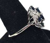 Sparkling 14K White Gold Blue Sapphire Gemstone and Diamond Ring