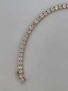 CERTIFIED BRAND NEW 14K YELLOW GOLD TENNIS BRACELET. 11.00 CARATS OF DIAMONDS.