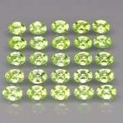 Dazzling 4.40ct untreated apple green Peridot set