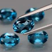 Pristine set of full fire London Blue Topaz weighing 4.78 carats!