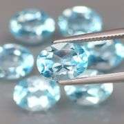 High fire and full of desire! Look at this vibrant 10.67ct Topaz set!