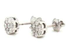 One pair of 14kt white gold 0.22ctw diamond cluster screw back earrings