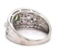 14kt White gold bezel set oval peridot and diamond flower Inspired milgrain ring