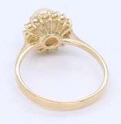 14kt Yellow gold 7mm pearl and diamond halo ring