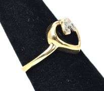 Delightful 10K Yellow Gold Black Onyx Heart Ring with Diamond Accents