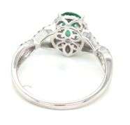 14kt White gold 0.65ct pear shaped emerald and 0.25ctw diamond infinity ring