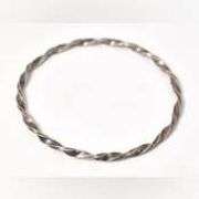 Twisted Bangle Bracelet in Sterling Silver.