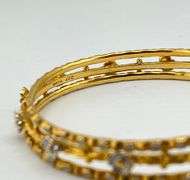 22KT Yellow Gold Hand Made Set Of Three Gold And White Flower Motifs Bangles