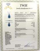 14kt White gold 3.21ct Pear shaped emerald and 1.30ctw marquise and round diamond halo teardrop pend