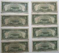 Eight $5 1963 Red Seal US Notes