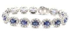 Enamoring Designer Oscar Friedman 9.76CTW Oval Faceted Tanzanite & Diamond Bracelet in 14K White Gol