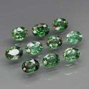 Heated only! 2.33ct blue green Sapphire set