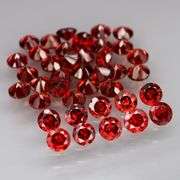 Outstanding 12.91ct top Mozambique red Garnet set!