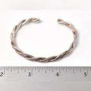 Braided Twist Cuff Bracelet in Sterling Silver.