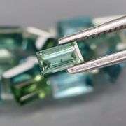 Exotic 3.06ct 24pc single vein blue green Sapphire set