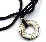 Tiffany & Co Atlas circle pendant on black cord necklace