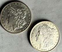 1884 O &1904 O Frosty White BU Morgans