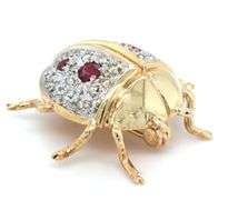 14kt Yellow gold 0.45ctw ruby and diamond lady bug pin