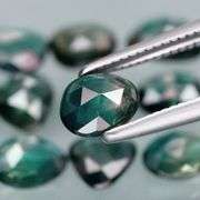 Awesome 4.60ct blue green rose cut Sapphire set!