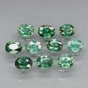 Heated only! 2.33ct blue green Sapphire set