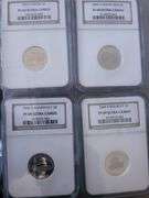 Collection of four 5c 2004 and 2005, one set of US special mint set