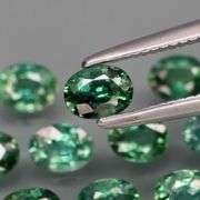 Heated only! 2.33ct blue green Sapphire set