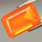 Holy cow! Look at that color! 4.63ct tangerine orange Fire Opal!