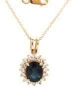14kt Yellow gold oval blue sapphire and diamond halo pendant on chain