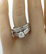 14kt White gold 0.78ct round brilliant cut in 0.65ctw diamond wedding set