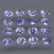 Heavy flashing 2.92ct oval cut Tanzanite set