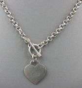 Vintage 925 Sterling silver necklace with heart shaped charm