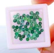 2.45 carats of real round cut Colombian Emeralds!