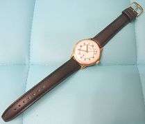 CONTENT OF SAFE DEPOSIT BOX: RARE MEN'S HERMES OF PARIS WATCH