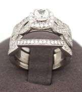 10kt White gold 0.50ct cushion cut and diamond halo wedding set