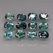 Heated only! 3.47ct bright blue green Sapphire set!