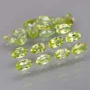 High grade 5.24ct untreated apple green Peridot set