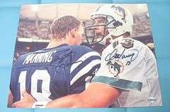 HAND SIGNED PEYTON MANNING AND DAN MARINO 8X10 WITH COA