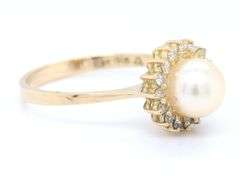 14kt Yellow gold 7mm pearl and diamond halo ring