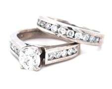 14kt White gold 0.78ct round brilliant cut in 0.65ctw diamond wedding set