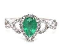 14kt White gold 0.65ct pear shaped emerald and 0.25ctw diamond infinity ring
