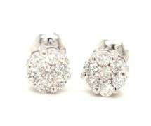 One pair of 14kt white gold 0.22ctw diamond cluster screw back earrings