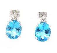14kt White gold 7.2ctw blue topaz and diamond accent earrings