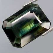 Massive! 13.02ct emerald cut Sapphire with swirling saturation!