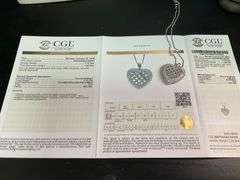 CERTIFIED 14K WHITE GOLD AND DIAMOND HEART PENDANT