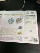 CERTIFIED 14K WHITE GOLD AND DIAMOND HEART PENDANT
