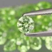 High grade 7.43ct untreated apple green Peridot set